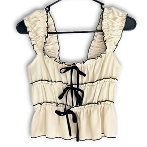 Elegant Cream Ruffled Women's Top with Black Trim & Bows